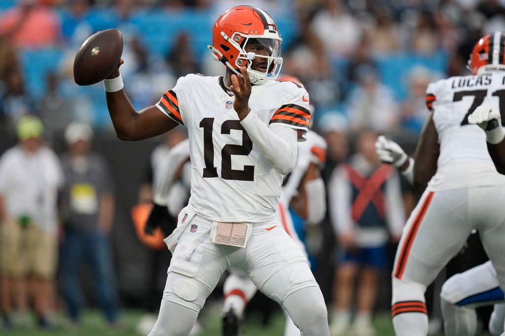 Cleveland Browns quarterback Shedeur Sanders (12) looks to pass against the Carolina Panthers during the first quarter at Bank of America Stadium. 