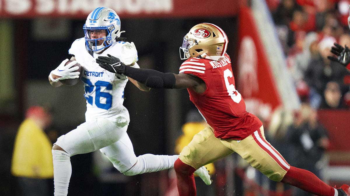 Detroit Lions running back Jahmyr Gibbs (26) runs against San Francisco 49ers safety Malik Mustapha (6) during the fourth quarter at Levi's Stadium.
