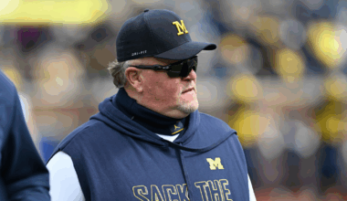 Michigan offensive coordinator Chip Lindsey, left, and offensive line coach Grant Newsome watch warm up before the spring game at Michigan Stadium in Ann Arbor on Saturday, April 19, 2025.