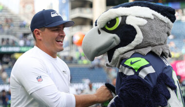 Seattle Seahawks Mike Macdonald and mascot Blitz...
