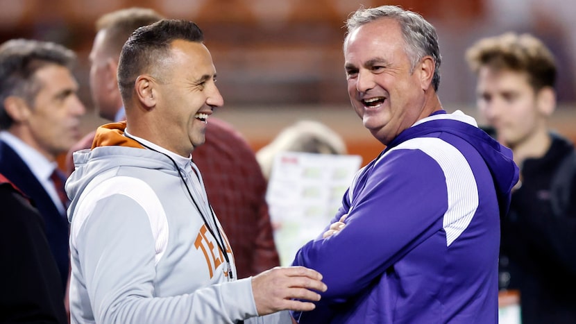 Texas Longhorns head coach Steve Sarkisian and TCU Horned Frogs head coach Sonny Dykes meet...