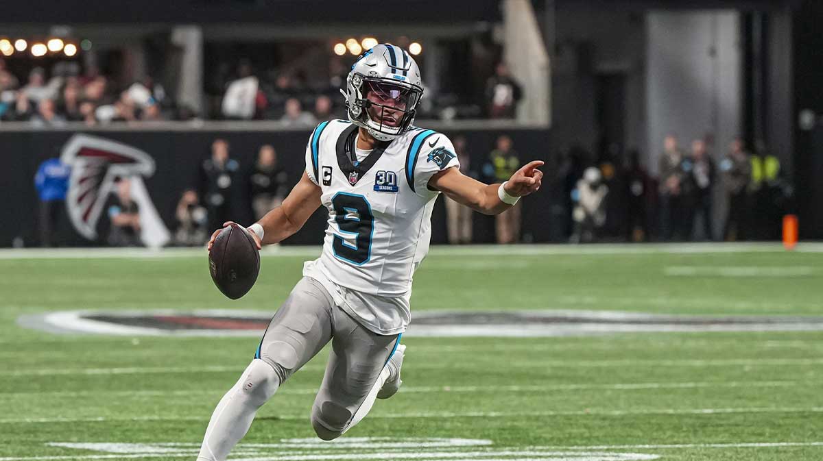 Carolina Panthers quarterback Bryce Young (9) runs for a touchdown against the Atlanta Falcons during the second half at Mercedes-Benz Stadium.