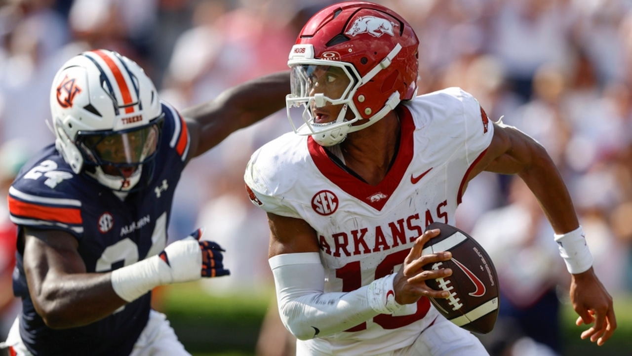 Arkansas quarterback Taylen Green scrambles during an SEC game against Auburn