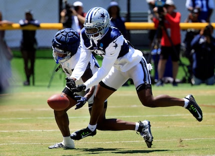 Dallas Cowboys cornerback DaRon Bland (26) attempts to intercept a pass thrown to Dallas...