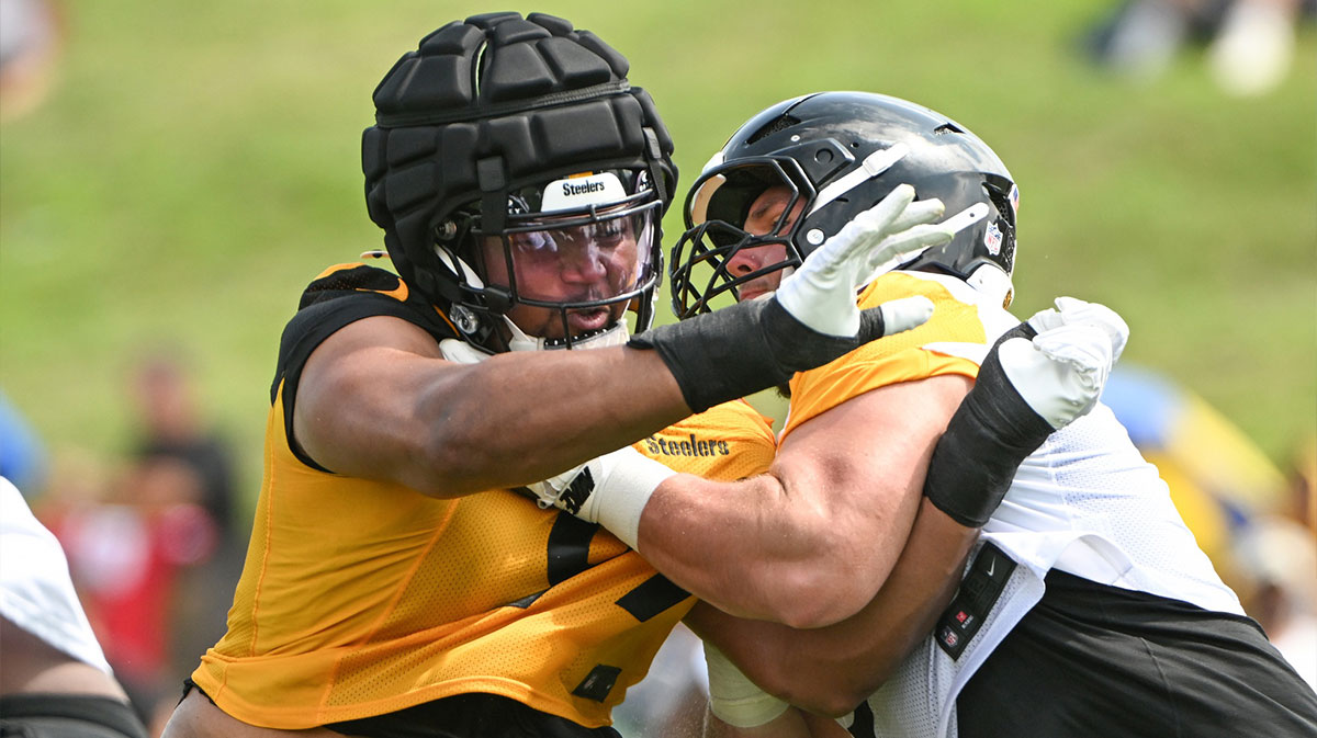 Pittsburgh Steelers defensive tackle Derrick Harmon (99) battles center Zach Frazier (54) during drills during training camp at Saint Vincent College.