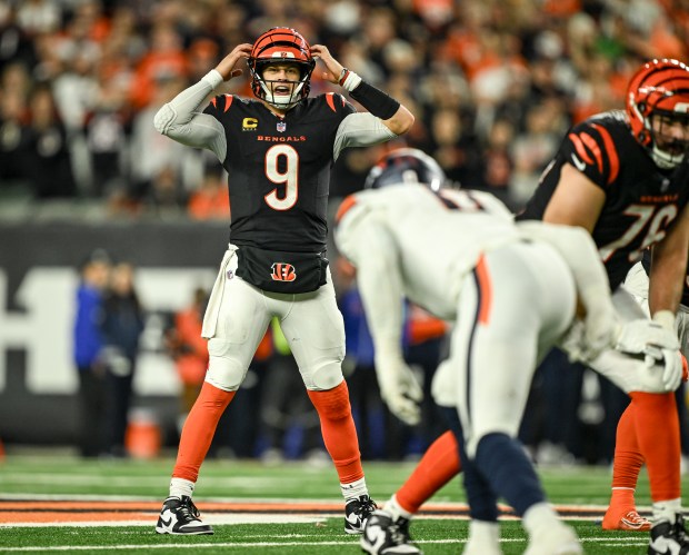 Joe Burrow (9) of the Cincinnati Bengals communicates with teammates pre-snap during the overtime period of the Bengals' 30-24 win over the Denver Broncos at Paycor Stadium in Cincinnati, Ohio on Saturday, Dec. 28, 2024. (Photo by AAron Ontiveroz/The Denver Post)