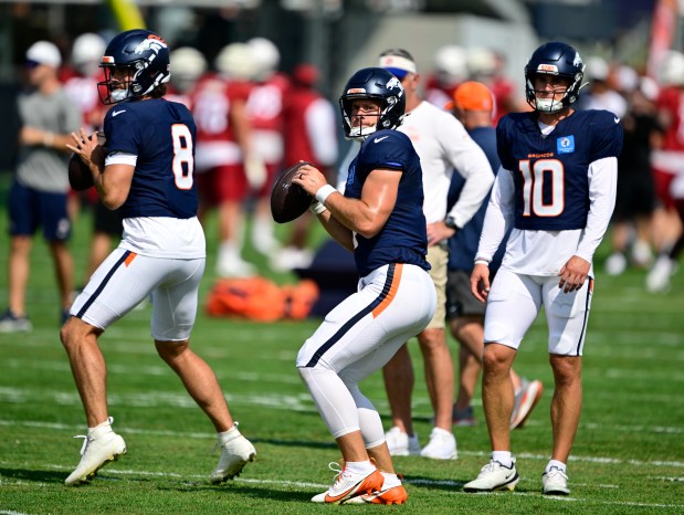 Denver Broncos quarterbacks Jarrett Stidham (8), Sam Ehlinger (4) and Bo Nix (10) during training camp at Broncos Park Powered by CommonSpirit in Centennial, Colorado, on Thursday, Aug. 14, 2025. (Photo by Andy Cross/The Denver Post)