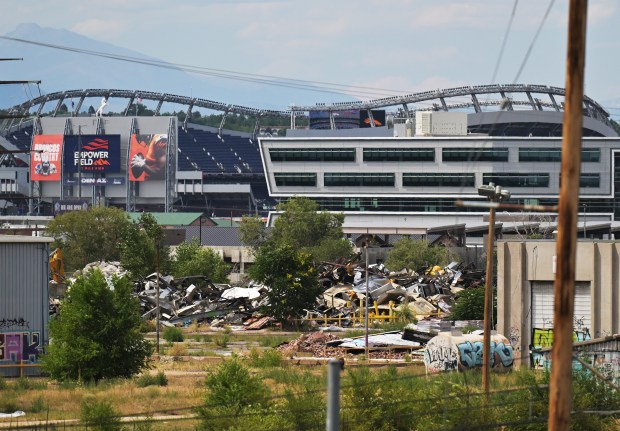 Several structures have been demolished recently at the abandoned Burnham Yard in Denver, as seen on July 28, 2025. Nearby Empower Field is visible in the background. (Photo by RJ Sangosti/The Denver Post)