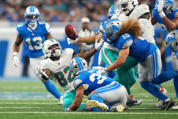Miami Dolphins Dee Eskridge (82) reaches out against Detroit Lions...
