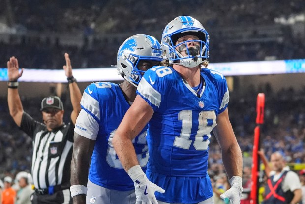 Detroit Lions wide receiver Isaac TeSlaa (18) celebrates his touchdown...