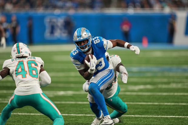 Detroit Lions wide receiver Jackson Meeks (83) carries against Miami...