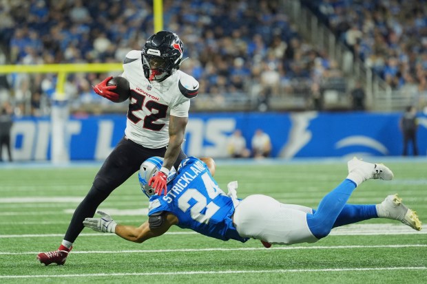 Houston Texans running back Jawhar Jordan (22) is tackled by...