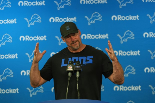 Detroit Lions coach Dan Campbell answers a question during a...