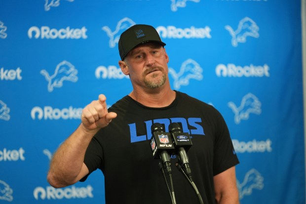 Detroit Lions coach Dan Campbell answers a question during a...