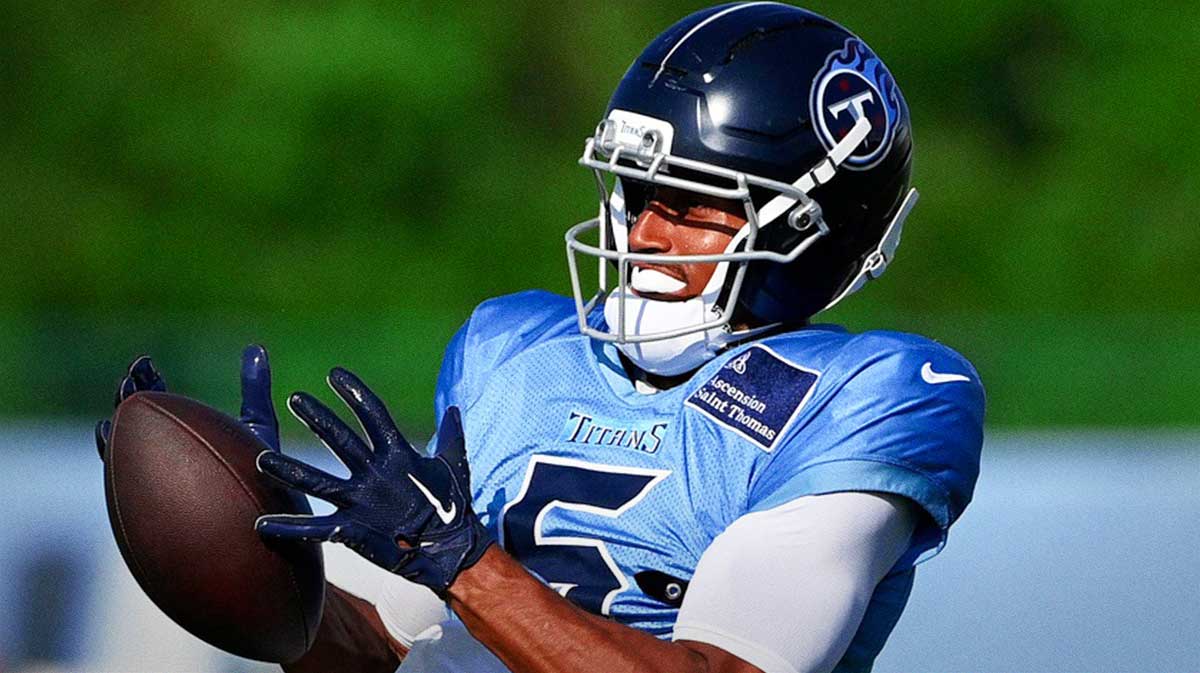 Tennessee Titans wide receiver Elic Ayomanor (5) makes a catch during an NFL football training camp practice at Ascension Saint Thomas Sports Park Saturday, Aug. 2, 2025, in Nashville, Tenn.