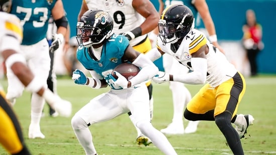 Jacksonville Jaguars wide receiver Travis Hunter (12) runs after a catch against the Pittsburgh Steelers (IMAGN IMAGES via Reuters Connect)