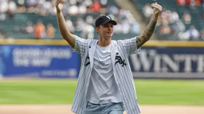 Aug 24, 2025; Chicago, Illinois, USA; Chicago Bears quarterback Tyson Bagent throws out a ceremonial first pitch before a baseball game between the Chicago White Sox and Minnesota Twins at Rate Field.