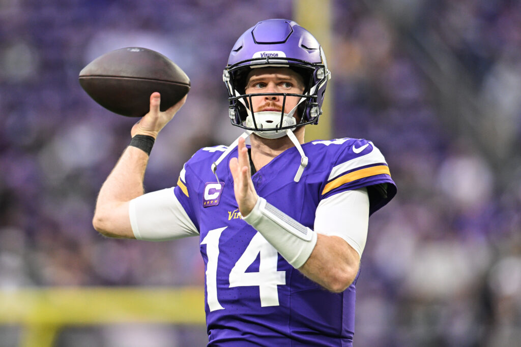 Minnesota Vikings quarterback Sam Darnold (14) warms up before the game against the Green Bay Packers at U.S. Bank Stadium.