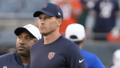 Chicago, Illinois, USA; Chicago Bears head coach Ben Johnson on the field before a game against the Buffalo Bills at Soldier Field.