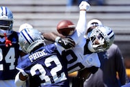 Dallas Cowboys cornerback Troy Pride Jr. (32) breaks up a pass thrown to wide receiver...