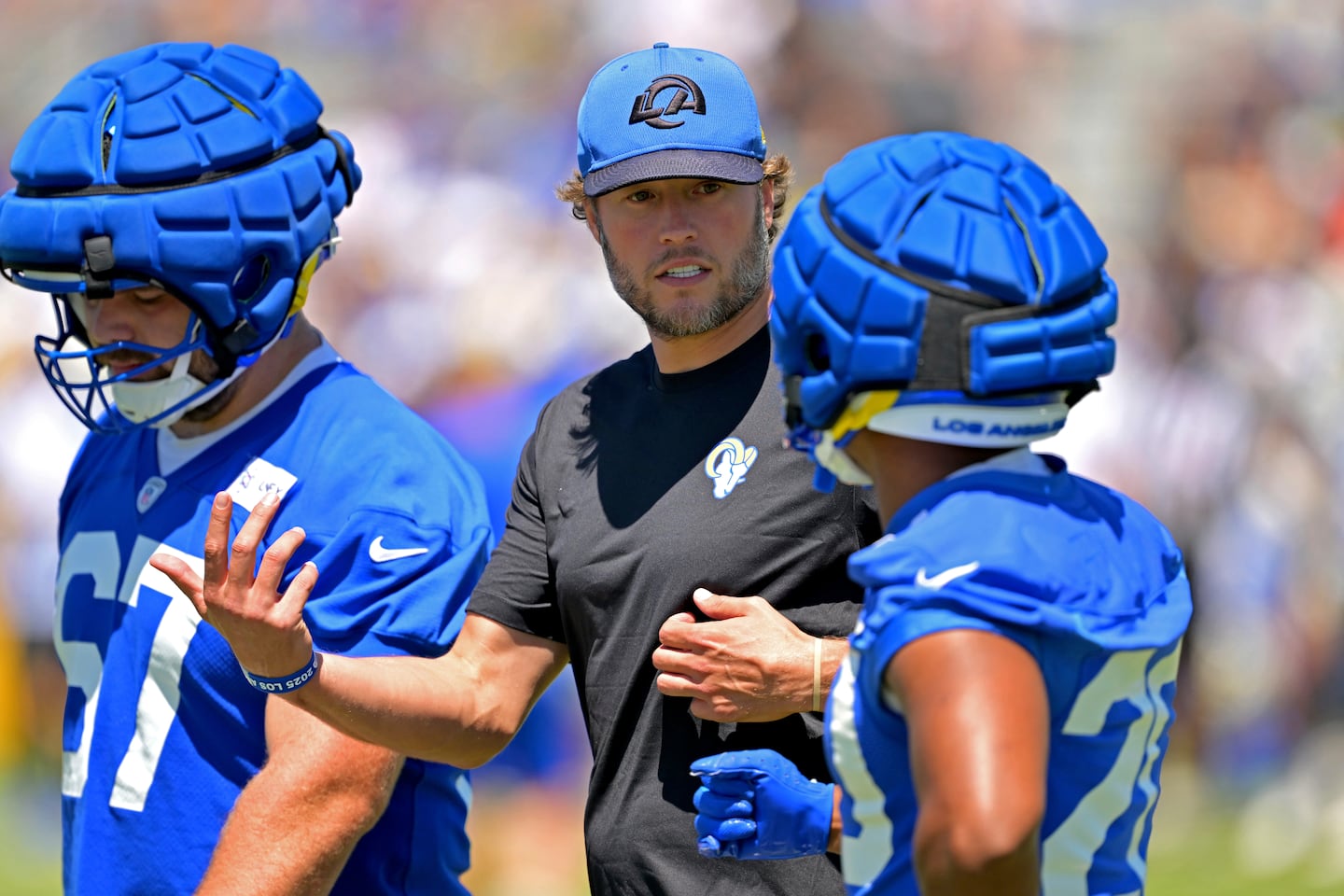 Rams quarterback Matthew Stafford hasn't practiced at training camp because of another back injury.