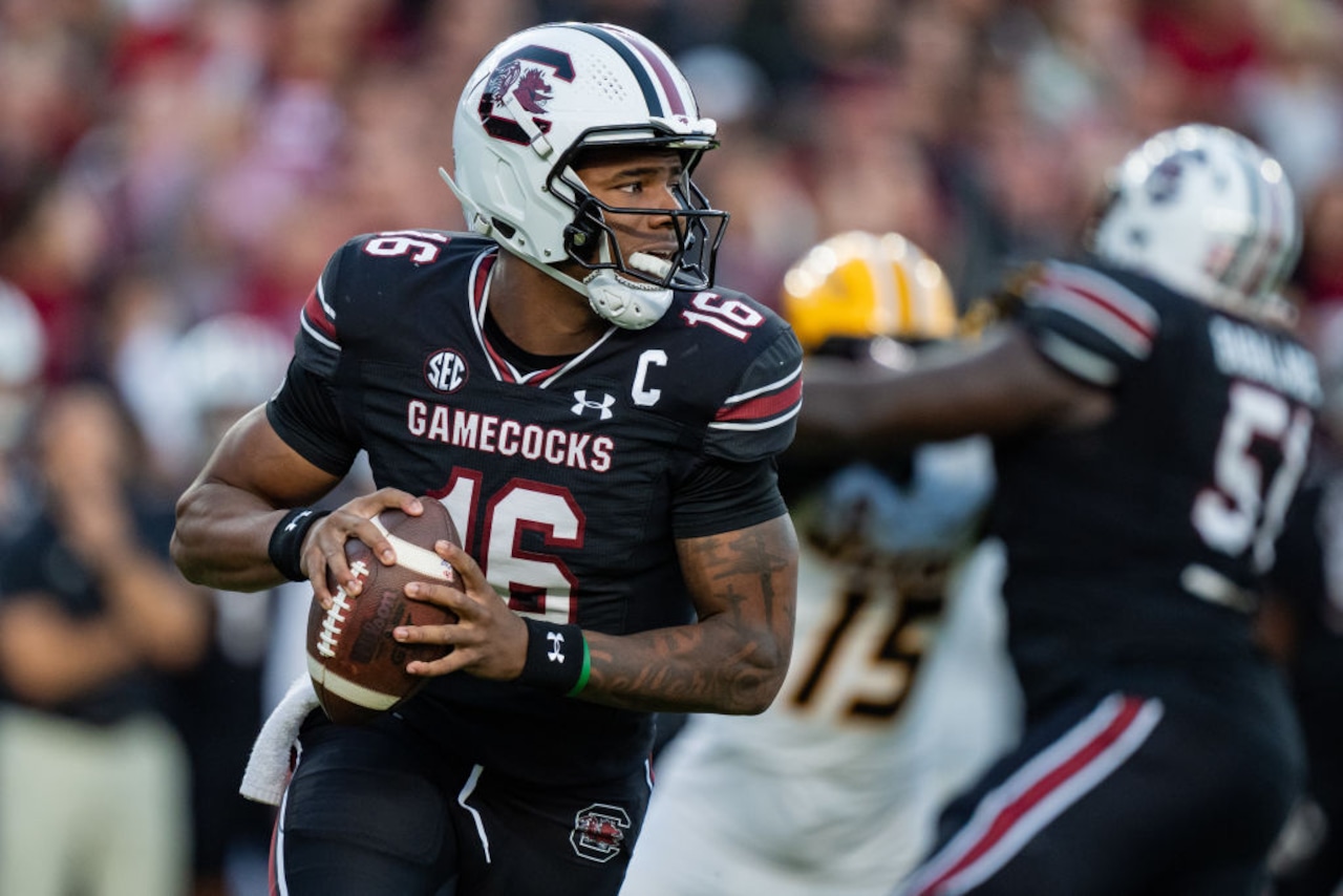 South Carolina quarterback LaNorris Sellers rolls out during an SEC game against Missouri