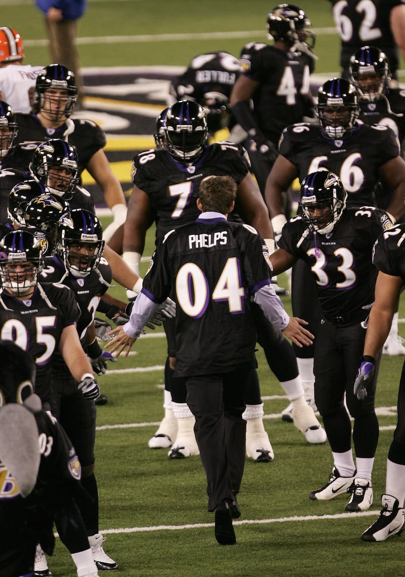 Michael Phelps was welcomed to the field as an honorary guest of the Baltimore Ravens in 2004. He went on to become one of the city’s most famous athletes.