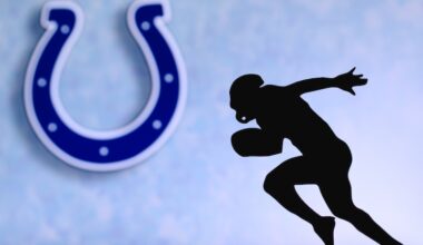 Indianapolis Colts. Silhouette of professional american football player. Logo of NFL club in background, edit space.