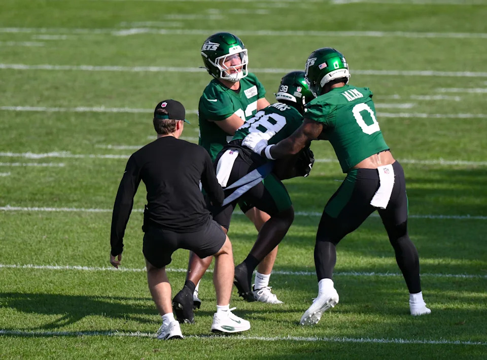 Jul 24, 2025; Florham Park, NY, USA; New York Jets running back Isaiah Davis (32), running back Zach Evans (38) and running back Braelon Allen (0) participate in a drill during training camp at Atlantic Health Jets Training Center. Mandatory Credit: John Jones-Imagn Images