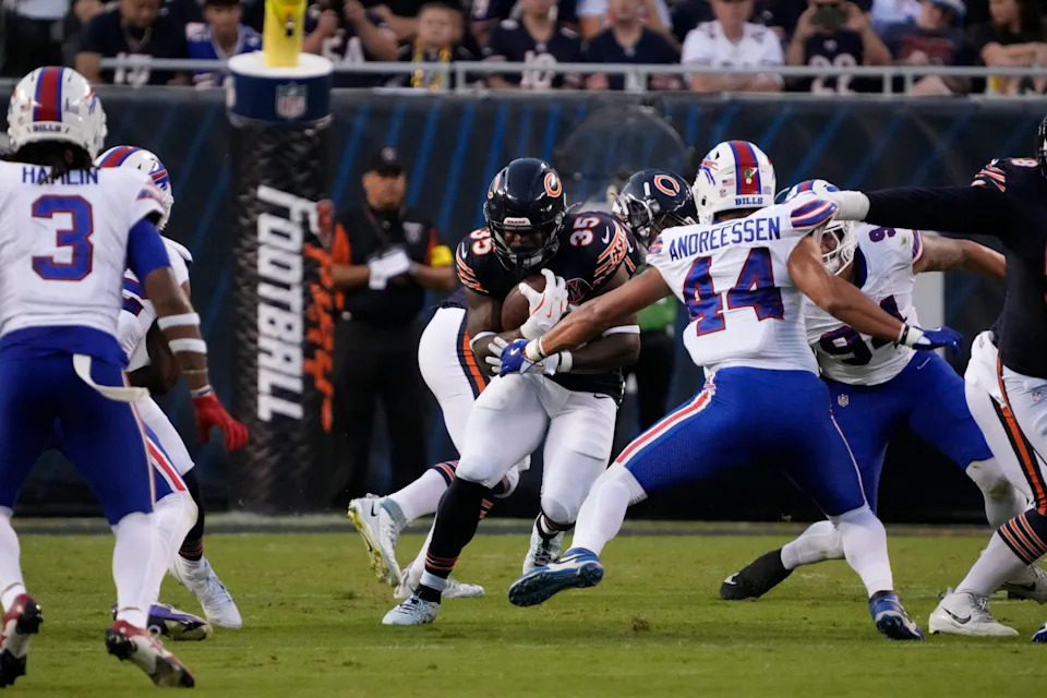 Aug 17, 2025; Chicago, Illinois, USA; Buffalo Bills linebacker Joe Andreessen (44) makes tackle on Chicago Bears running back Deion Hankins (35) during the first quarter at Soldier Field. Mandatory Credit: David Banks-Imagn Images