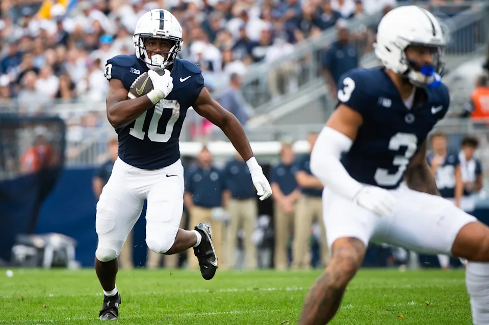 Penn State running back Nick Singleton (10) carries the ball in the first half of an NCAA football game against Kent State, Saturday, Sept. 21, 2024, in State College, Pa.