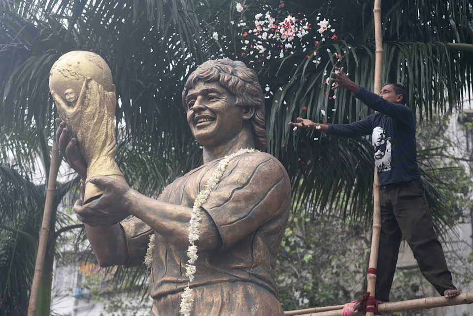 Argentinian soccer legend Diego Maradona has a statue in Kolkata, India. The 1986 World Cup in Mexico, which Maradona helped the Argentine team lift, was the first World Cup to be live telecast in India. (Photo by Samir Jana/Hindustan Times via Getty Images)