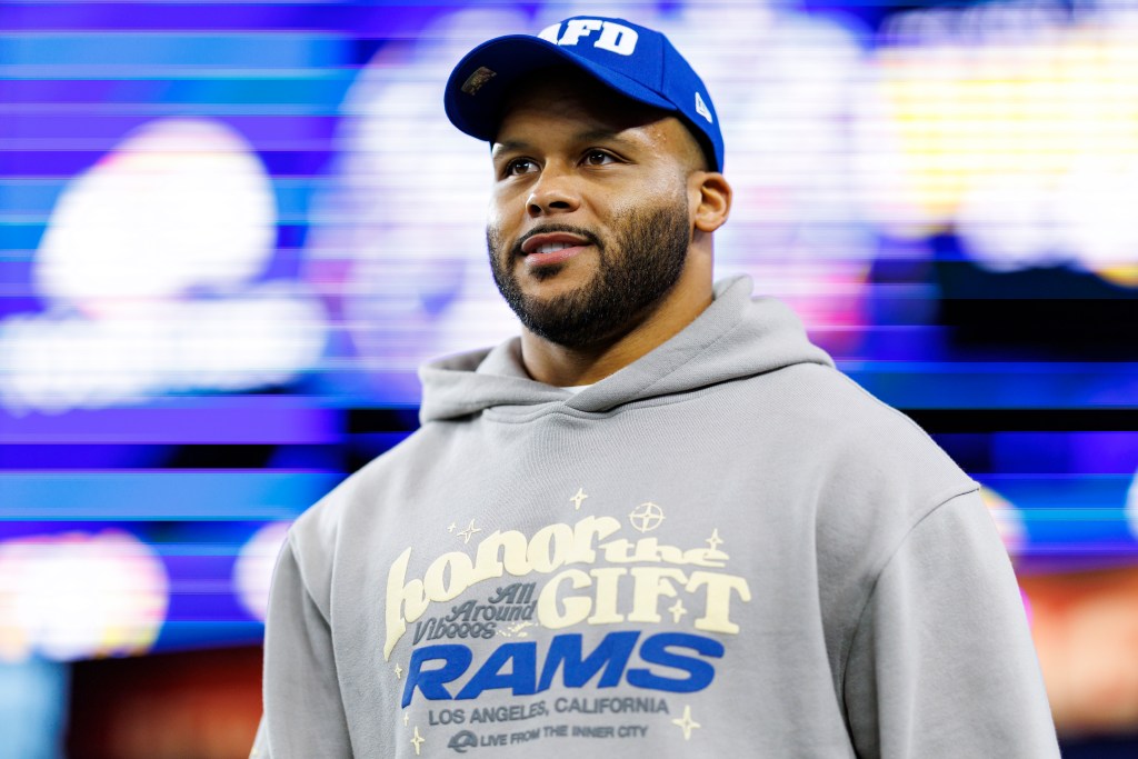 Photo of a man wearing a Rams hoodie.
