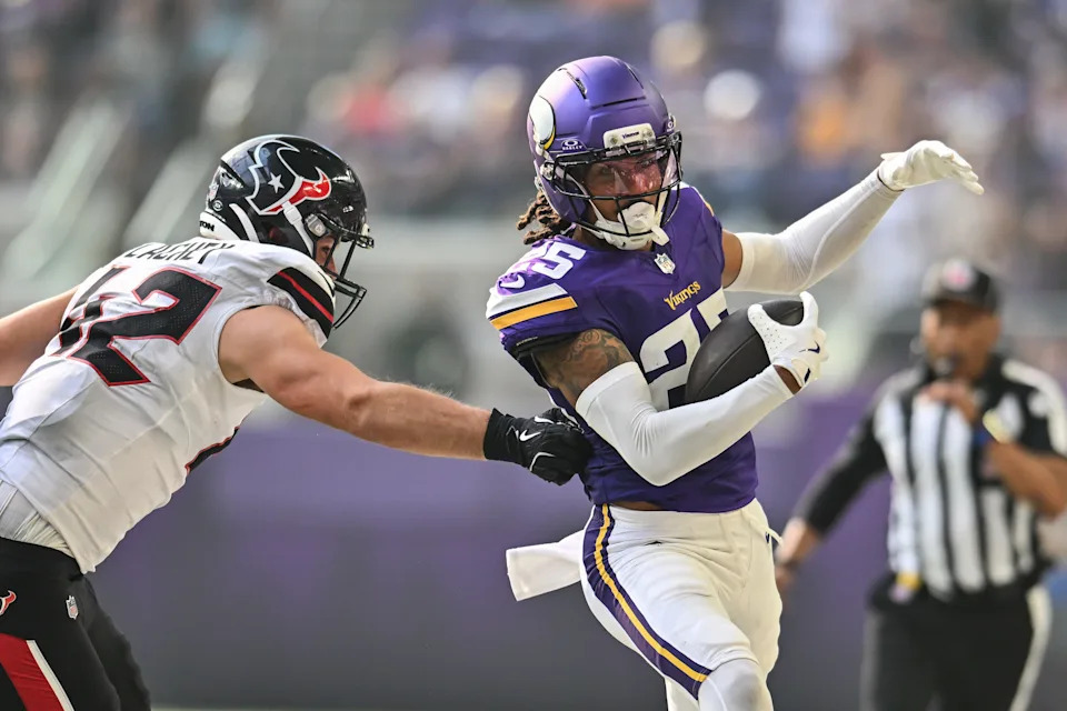Aug 9, 2025; Minneapolis, Minnesota, USA; Minnesota Vikings cornerback Kahlef Hailassie (25) returns an interception during the fourth quarter as Houston Texans tight end Luke Lachey (42) pushes him out of bounds at U.S. Bank Stadium. Mandatory Credit: Jeffrey Becker-Imagn Images