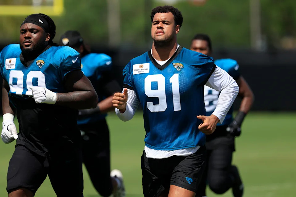 Jacksonville Jaguars defensive end Arik Armstead (91) runs after an NFL training camp session at the Miller Electric Center, Thursday, Aug. 14, 2025 in Jacksonville, Fla.