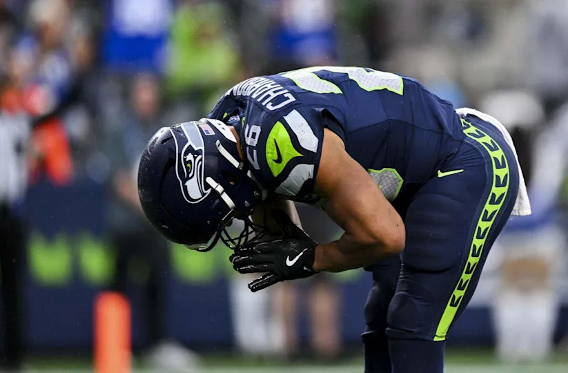 Seattle Seahawks running back Zach Charbonnet (26) bows after scoring a touchdown during the first quarter of the preseason game against the Kansas City Chiefs at Lumen Field, on Friday, Aug. 15, 2025, in Seattle.