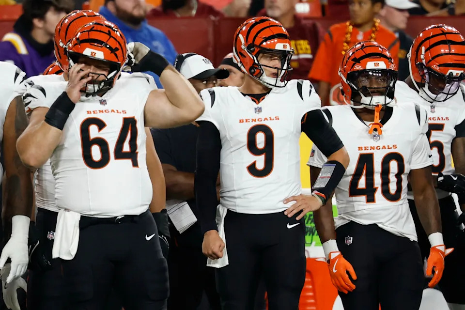 Aug 18, 2025; Landover, Maryland, USA; Cincinnati Bengals quarterback Joe Burrow (9) prepares to take to the field against the Washington Commanders during the first quarter at Northwest Stadium.