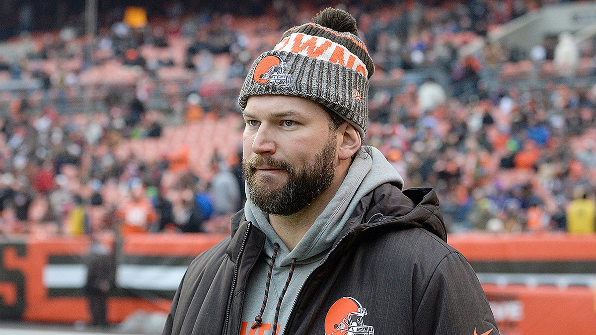 Joe Thomas looks on