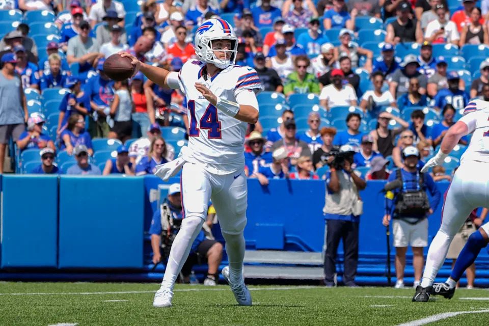 Aug 9, 2025; Orchard Park, New York, USA; Buffalo Bills quarterback Mike White (14) throws the ball against the New York Giants during the second half at Highmark Stadium. Mandatory Credit: Gregory Fisher-Imagn Images