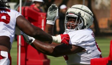 Arizona Cardinals rookie DL Elijah Simmons goes through practice drills...