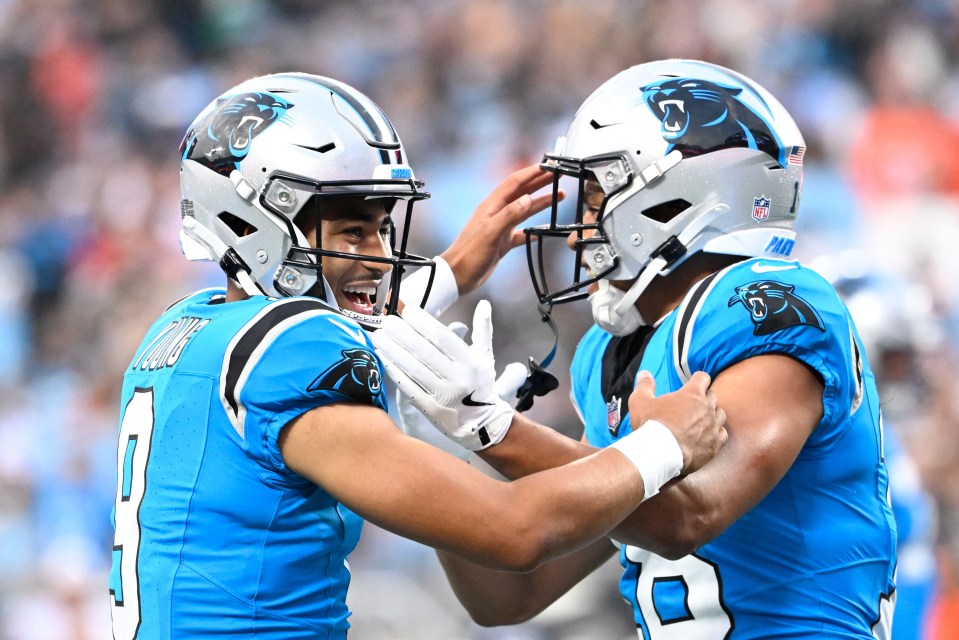 Carolina Panthers players celebrating a touchdown.