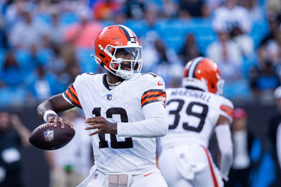 Cleveland Browns quarterback Shedeur Sanders (12) holding a football.