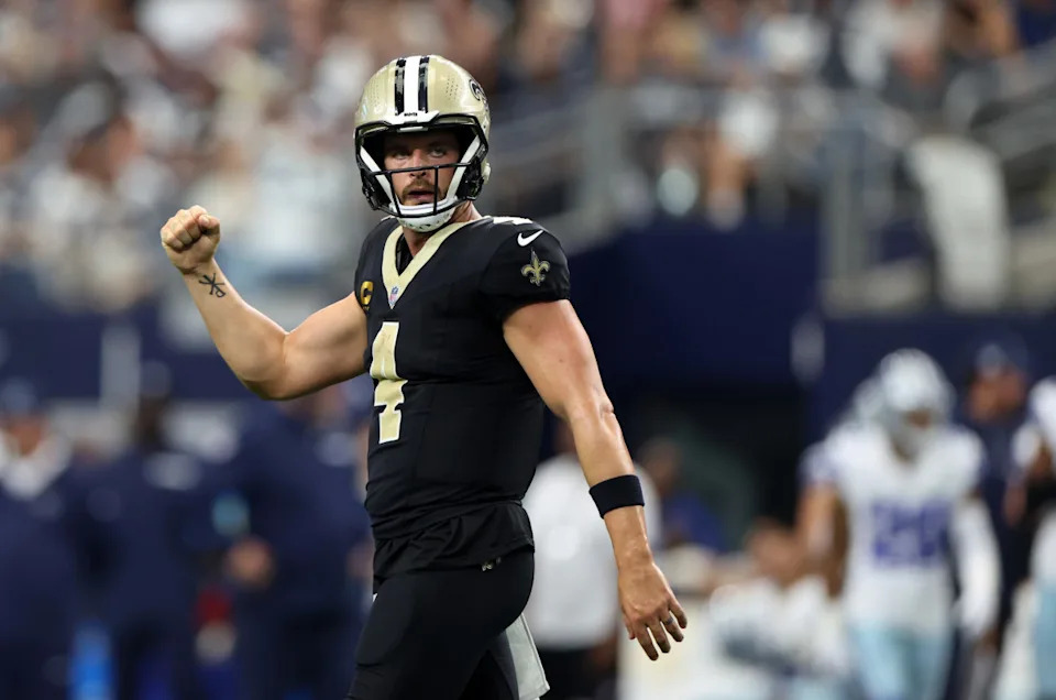 ARLINGTON, TEXAS - SEPTEMBER 15: Derek Carr #4 of the New Orleans Saints celebrates a touchdown pass during the third quarter against the Dallas Cowboys at AT&T Stadium on September 15, 2024 in Arlington, Texas. (Photo by Ron Jenkins/Getty Images)Ron Jenkins&sol;Getty Images