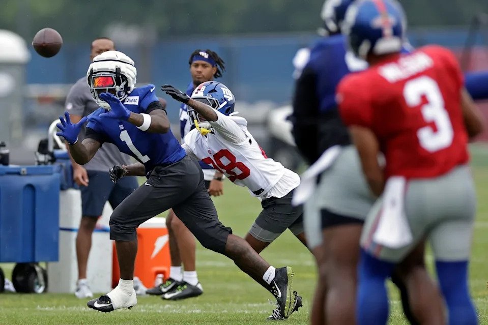 Giants wide receiver Malik Nabers (1) makes a catch on a pass thrown by Russell Wilson. AP