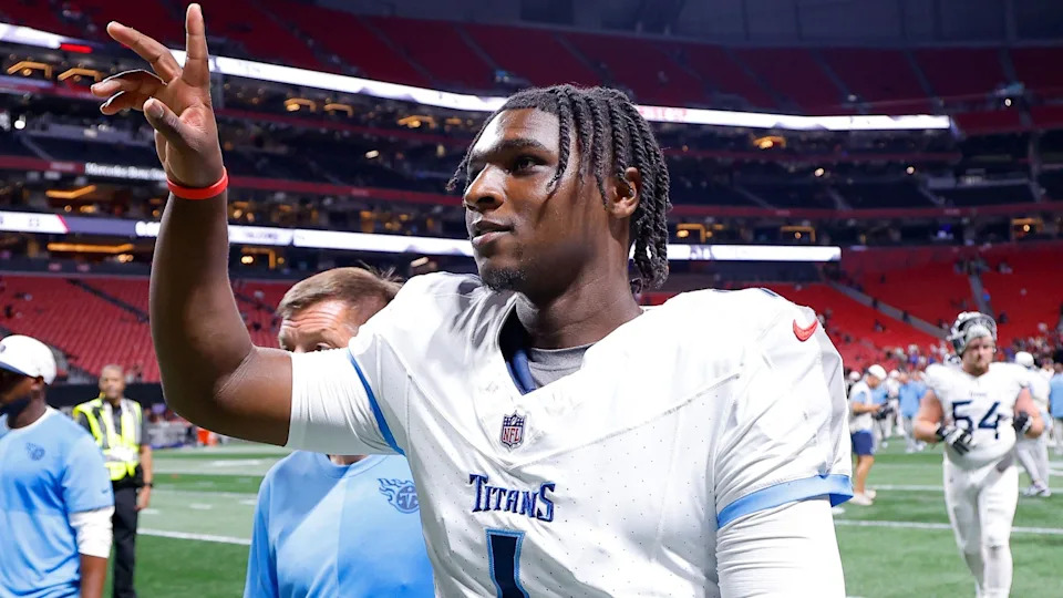 Tennessee Titans quarterback Cam Ward waves to the crowd in Atlanta