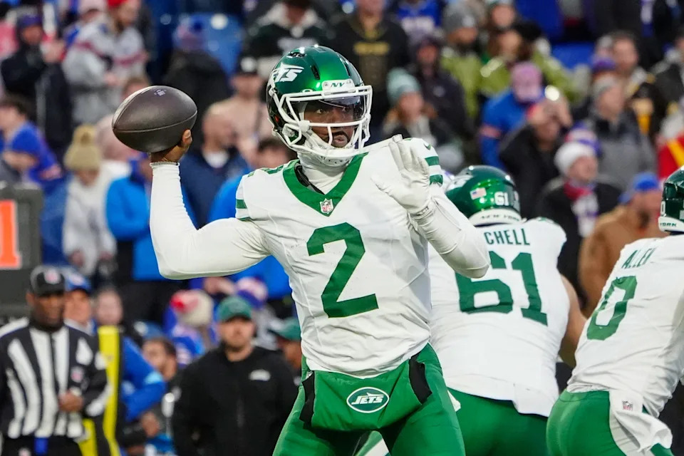 Dec 29, 2024; Orchard Park, New York, USA; New York Jets quarterback Tyrod Taylor (2) throws the ball against the Buffalo Bills during the second half at Highmark Stadium. Mandatory Credit: Gregory Fisher-Imagn Images