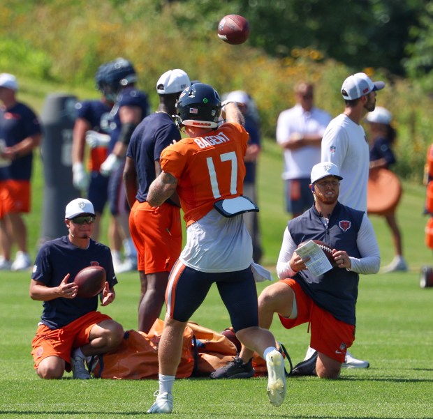 Bears quarterback Tyson Bagent throws a pass during an interception drill at a joint practice with the Dolphins at Halas Hall on Aug. 8, 2025, in Lake Forest. (Stacey Wescott/Chicago Tribune)