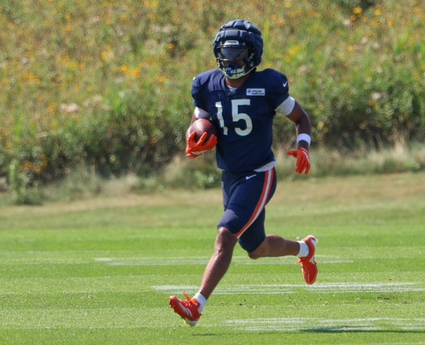 Bears wide receiver Rome Odunze runs down field after catching a pass during a joint practice with the Dolphins at Halas Hall on Aug. 8, 2025, in Lake Forest. (Stacey Wescott/Chicago Tribune)