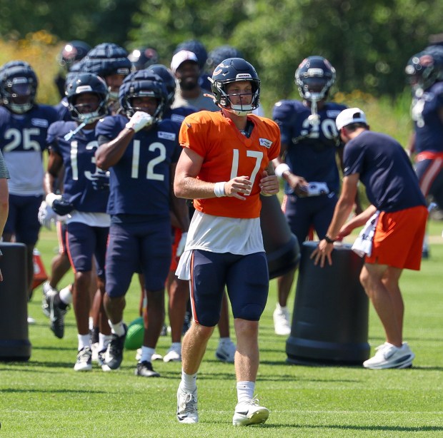 Bears quarterback Tyson Bagent runs downfield during a joint practice with the Dolphins at Halas Hall on Aug. 8, 2025, in Lake Forest. (Stacey Wescott/Chicago Tribune)