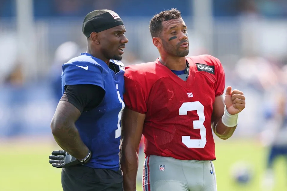 Giants wide receiver Malik Nabers (1) talks with quarterback Russell Wilson (3) during training camp. IMAGN IMAGES via Reuters Connect